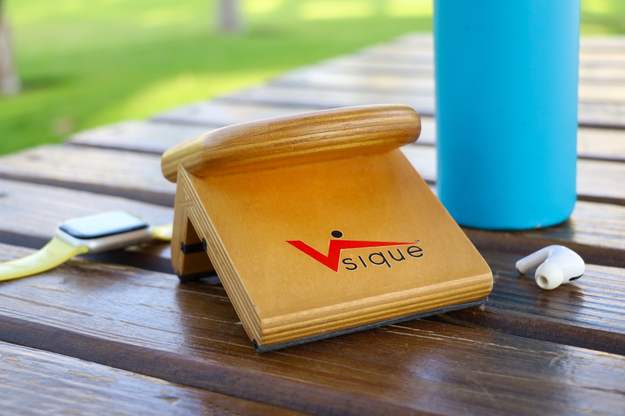 The original wooden Vsique trainer on a table, designed to be portable